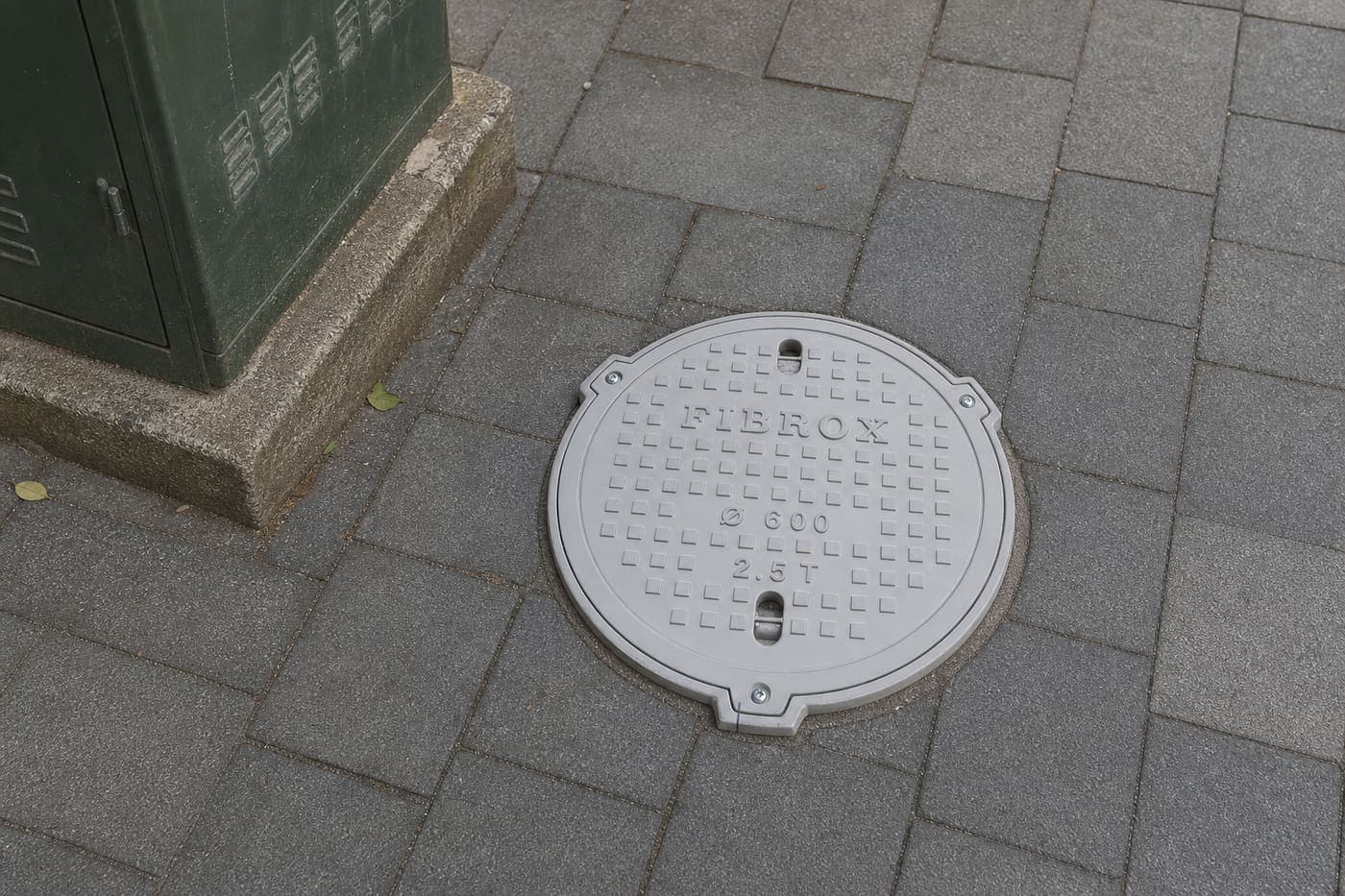 Fibrox FRP product — Manhole cover installed in residential footpath